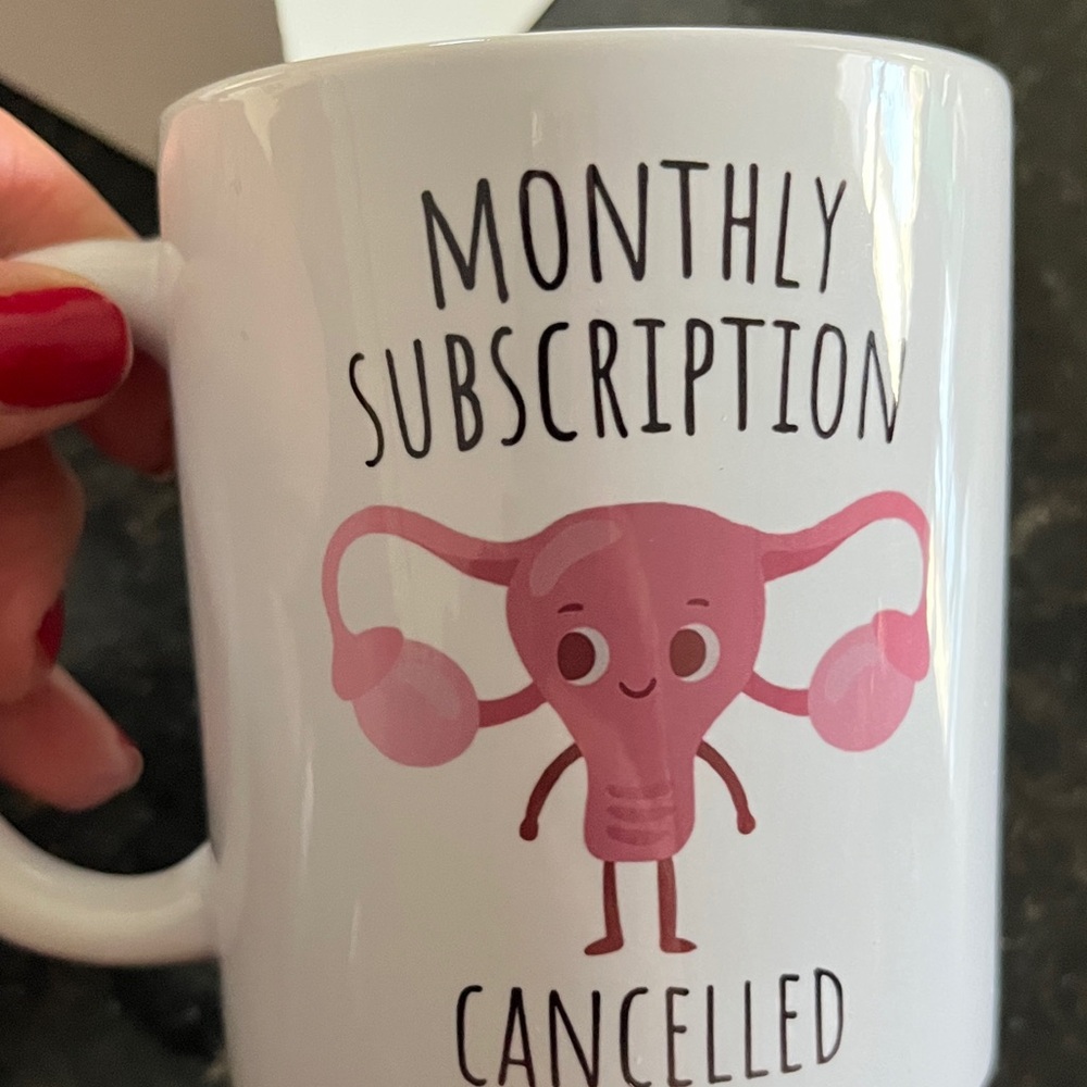 White Ceramic Mug with Pink Uterus Graphic - Monthly Subscription Cancelled